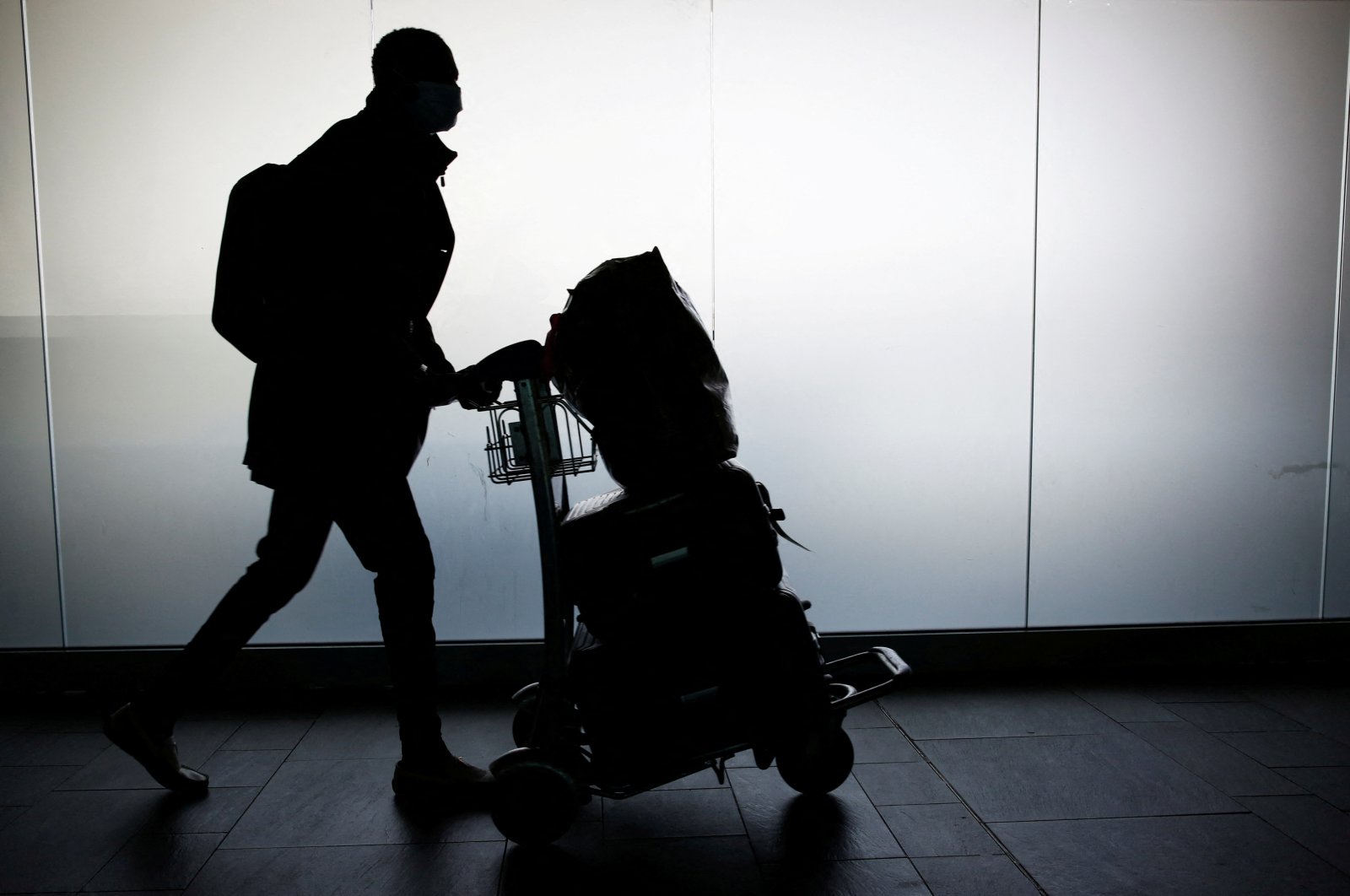 A man walks with his luggage at Fiumicino Airport amid the coronavirus pandemic, near Rome, Italy, May 17, 2021. (Reuters Photo)