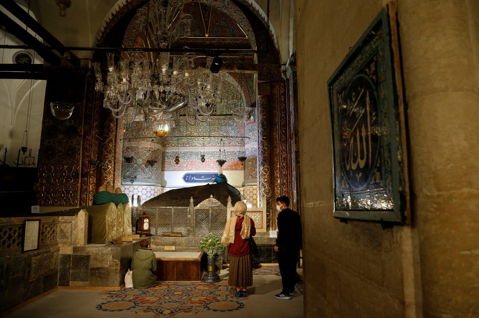 People visit the 15th century Selimiye Mosque with the tomb of Mevlana Jalaladdin Rumi, founder of Sufi Islam, in Konya, Turkey, Dec. 7, 2021. (Reuters Photo)