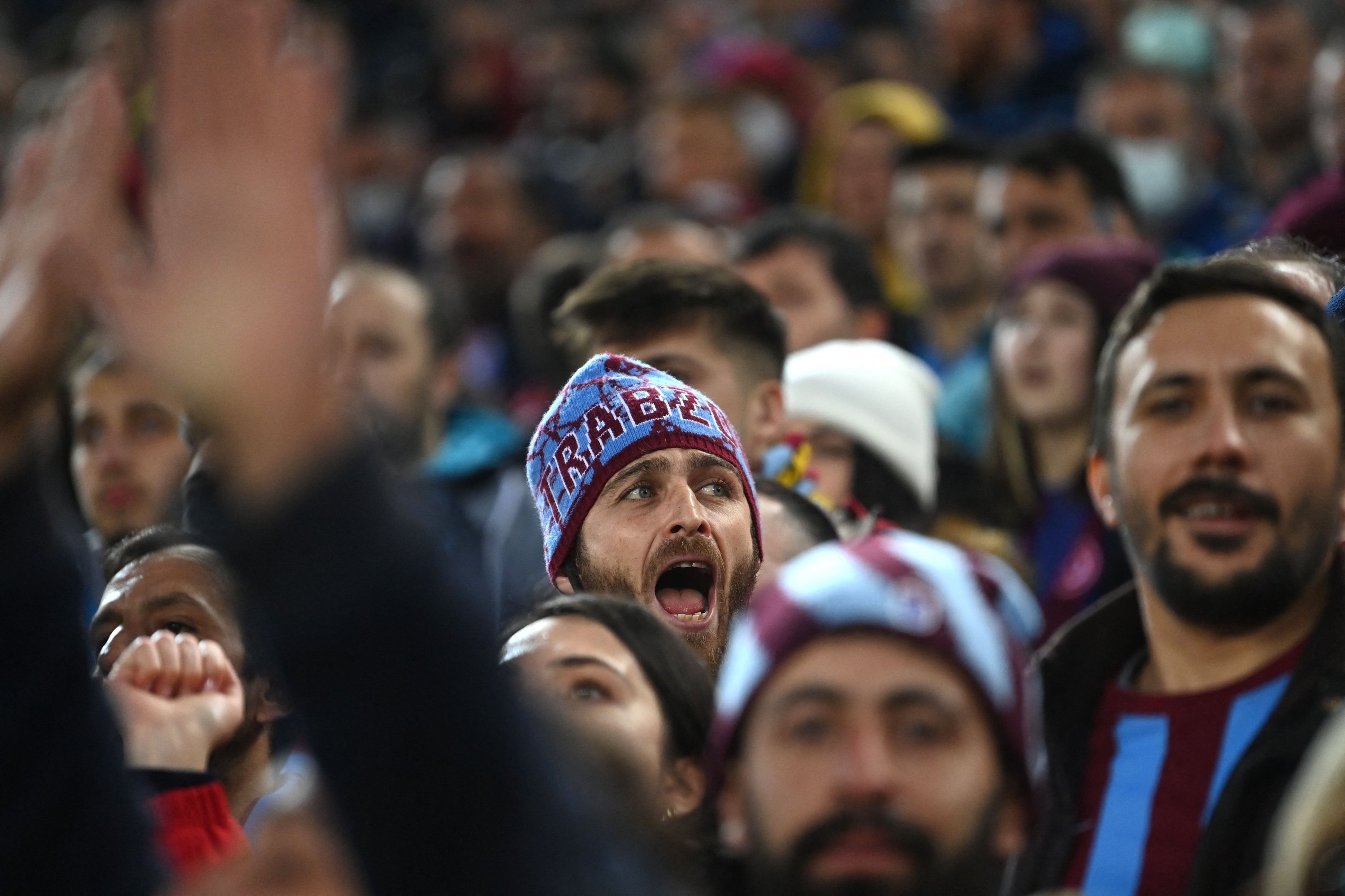 Trabzonspor fans cheer their team during a Süper Lig match against Hatayspor at the Medical Park Stadium in Trabzon, Dec. 18, 2021. (AFP Photo)