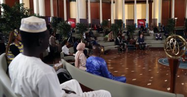 President Recep Tayyip Erdoğan (R) during a meeting with the African youth in the capital Ankara, Turkey, Dec. 19, 2021. (İHA Photo)