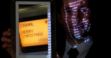NFT replica of the original communication protocol that transmitted the first SMS text message ever sent, Paris, France, Dec. 20, 2021. (Reuters Photo)