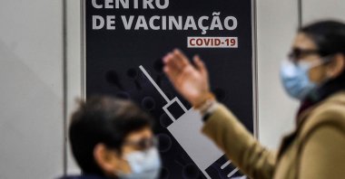Children accompanied by their parents wait to receive a dose of the COVID-19 vaccine at the vaccination center of Parque das Nacoes in Lisbon on Dec. 18, 2021. (AFP Photo)