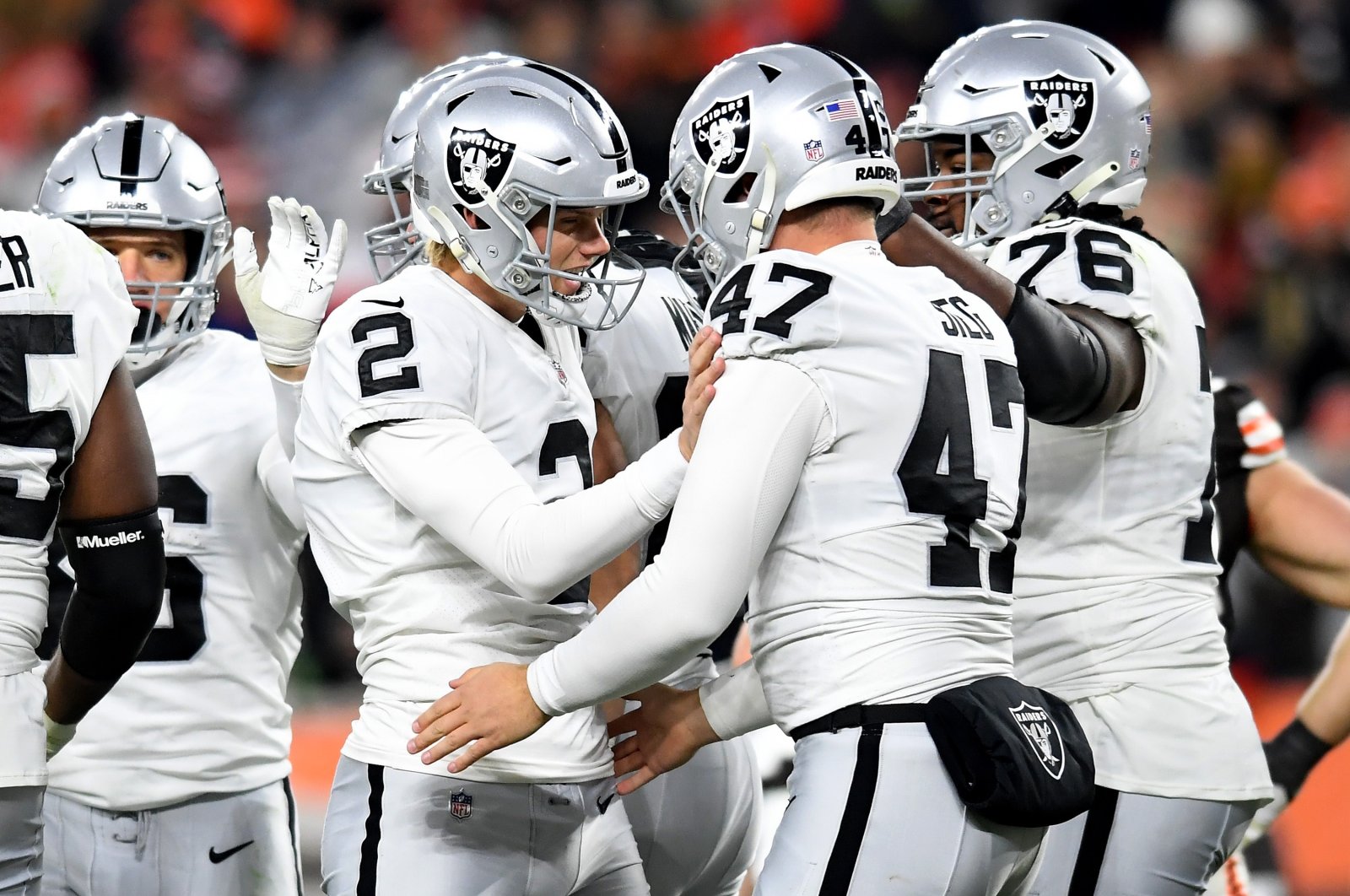 Las Vegas Raiders Daniel Carlson (2nd L) celebrates with teammates after scoring a successful field goal during an NFL game against the Cleveland Browns, Cleveland, Ohio, Dec. 20, 2021. (AFP Photo)