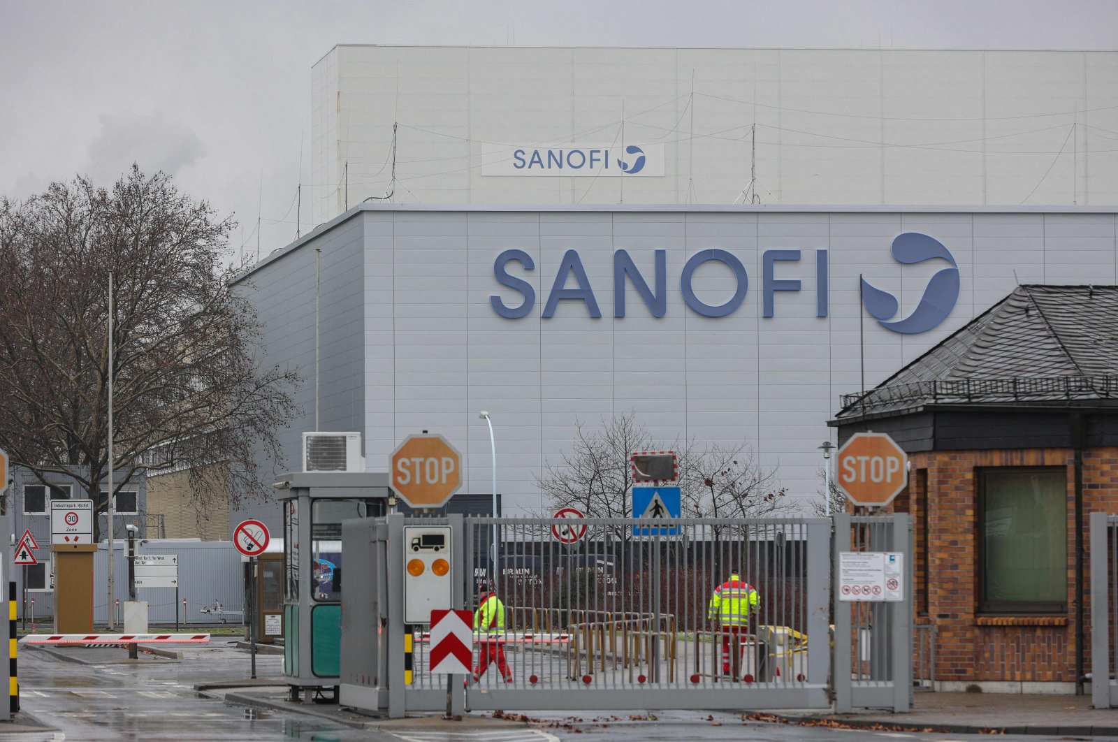 An entrance to the compound of the German headquarter of French pharmaceutical company Sanofi is pictured in the Hoechst industrial zone in Frankfurt am Main, western Germany, Jan. 27, 2021. (AFP Photo)