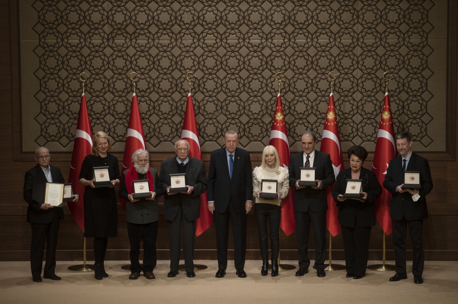 President Recep Tayyip Erdoğan (C) poses with the 2021 Presidential Culture and Arts Grand Awards recipients, Presidential Complex, Ankara, Turkey, Dec. 21, 2021. (AA)