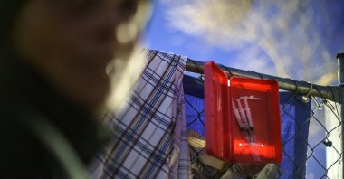 Prefilled syringes of naloxone are ready for use outside the gate where dozens of Native women are living in tents in the lot of an abandoned gas station in south Minneapolis, Nov. 15, 2021. (AP Photo)
