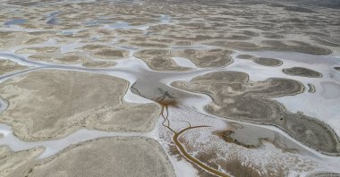 A drone shows the low level of water in Tuz Lake, the world's second saltiest lake, in central Turkey, Oct. 11, 2021. (Photo by Getty Images)