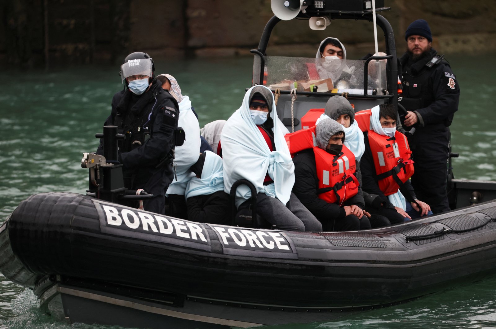 Migrants arrive at the Port of Dover on board a Border Force vessel after being rescued while crossing the English Channel, in Dover, Britain, Dec. 17, 2021. (Reuters Photo)