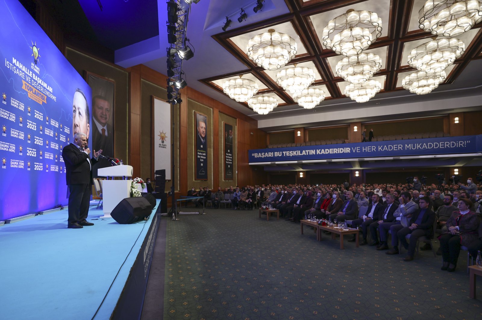 Former Prime Minister Binali Yıldırım speaks at an AK Party meeting with party members from Istanbul in Kızılcahamam, Ankara, Dec. 18, 2021. (AA File Photo)