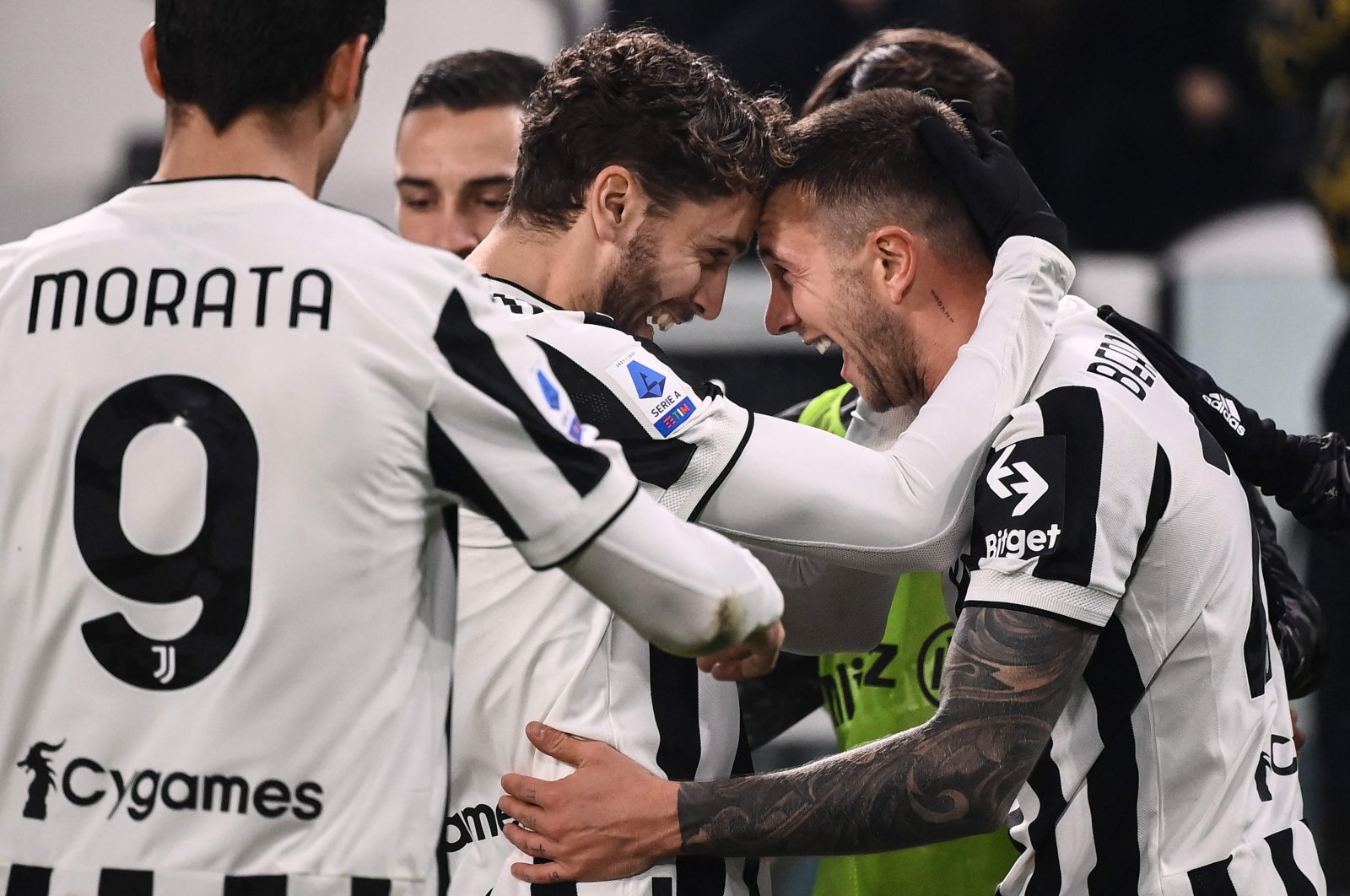 Juventus&#039; Federico Bernardeschi (R) celebrates with teammates after scoring a goal against Cagliari, Turin, Italy, Dec. 21, 2021. (AFP Photo)