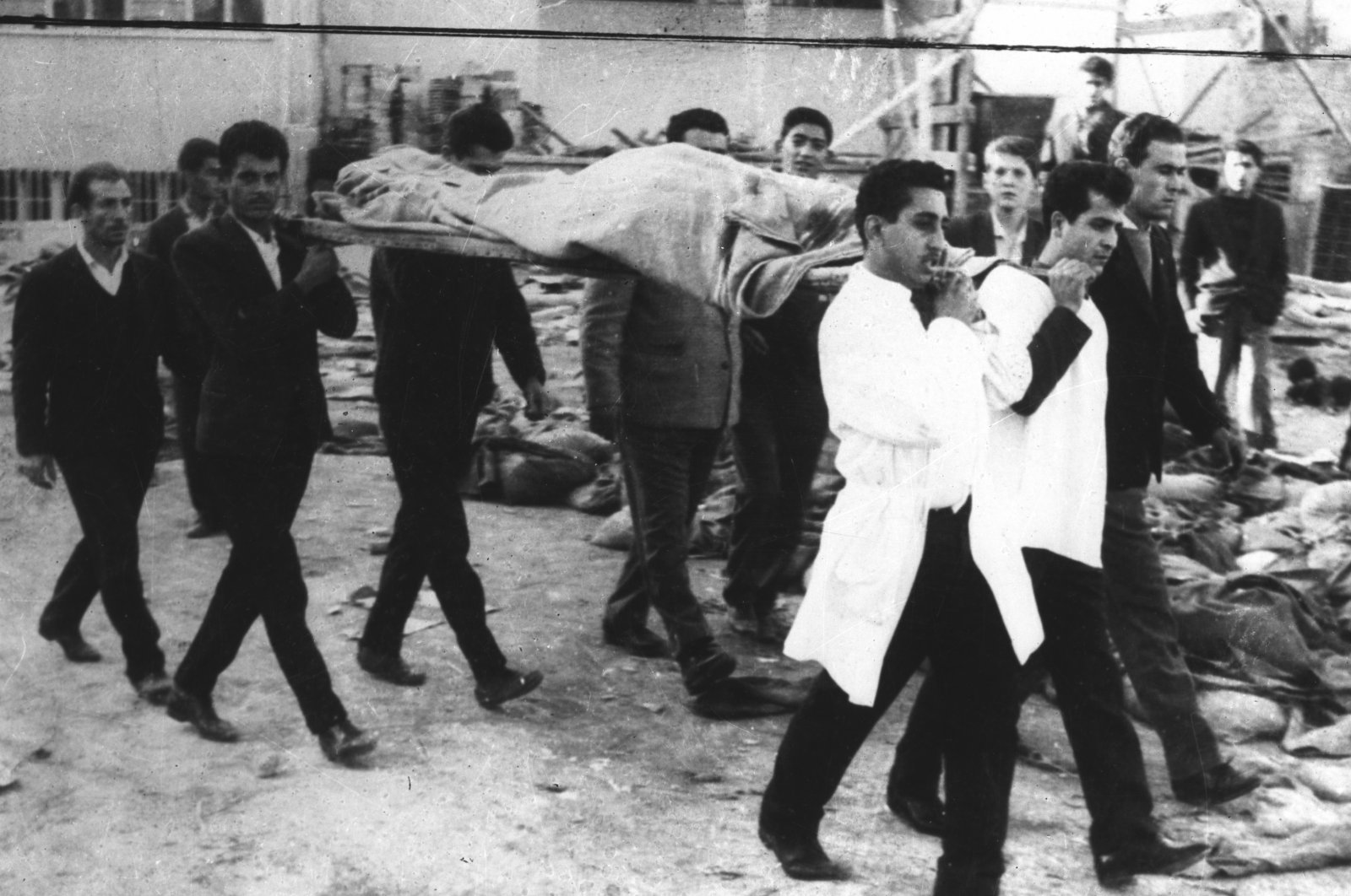 Turkish Cypriots carry the dead body of a victim who was killed by Greek Cypriot EOKA terrorists during the "Bloody Christmas."