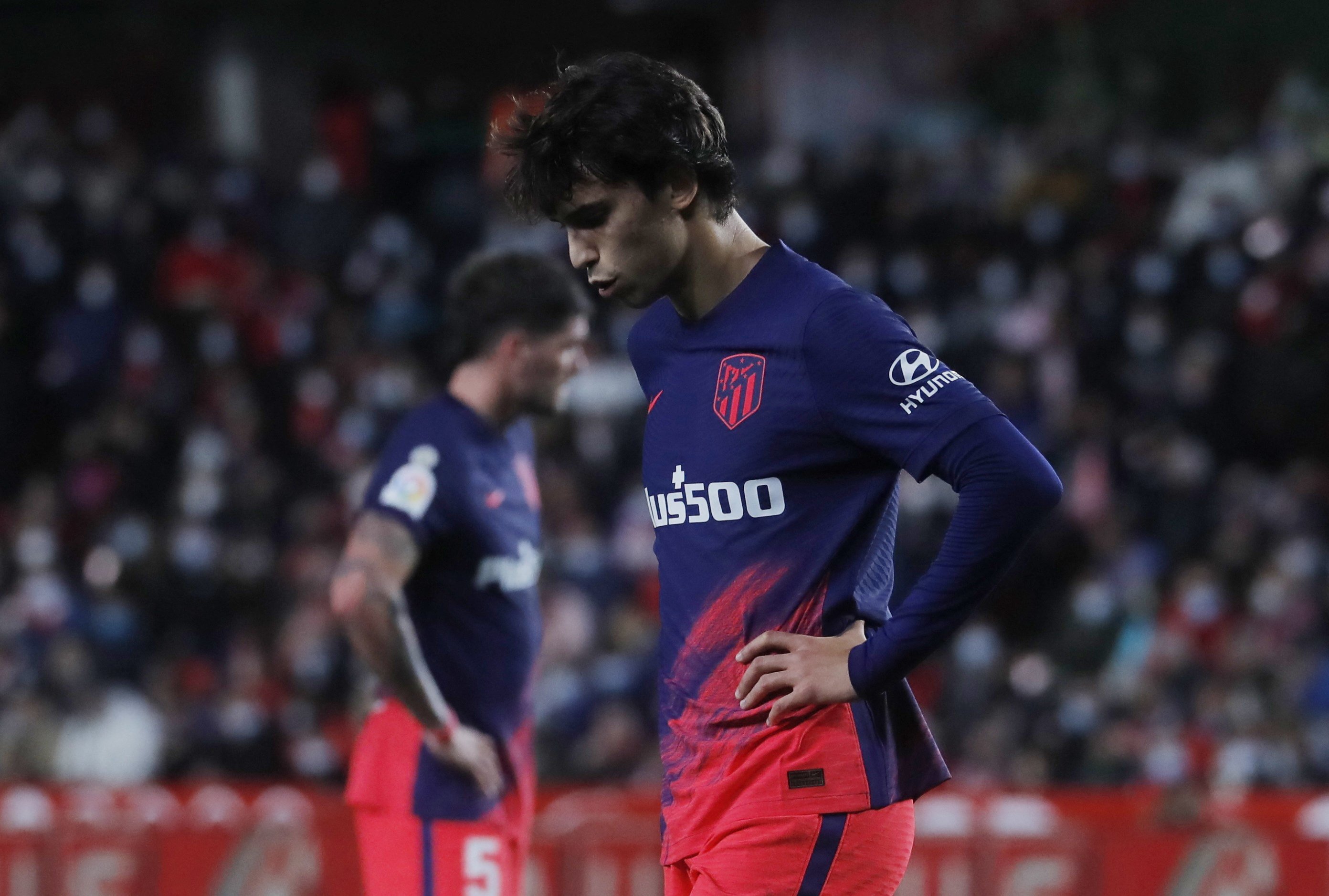 Atletico Madrid's Joao Felix looks dejected after a disallowed goal during a La Liga match against Granada at Nuevo Estadio de Los Carmenes, Granada, Spain, Dec. 22, 2021.