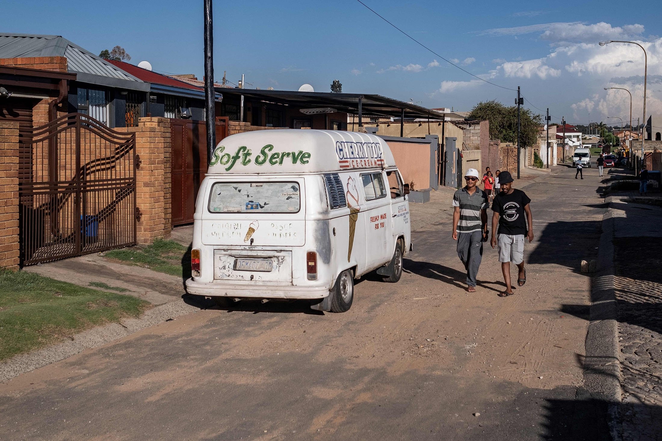 The owner of an ice cream truck, Sipho Mtshali, drives around Soweto, South Africa, Nov. 19, 2021. (AFP Photo)
