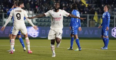 AC Milan's Franck Kessie (C) celebrates after scoring in a Serie A game against Empoli, Empoli, Italy, Dec. 22, 2021. (AP Photo)