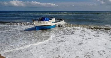 The wreck of the boat Francia, which sank off the coast, is pulled to the beach in northeastern Madagascar, Dec. 22, 2021. (Reuters photo)