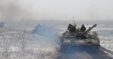 Service members of the 92nd Separate Mechanized Brigade of the Ukrainian armed forces take part in military drills at a shooting range in the Kharkiv region, Ukraine, Dec. 20, 2021. (Reuters Photo)