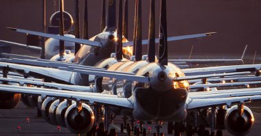 Lufthansa aircraft are parked on a runway at the airport in Frankfurt, Germany, March 15, 2020. (AP Photo)