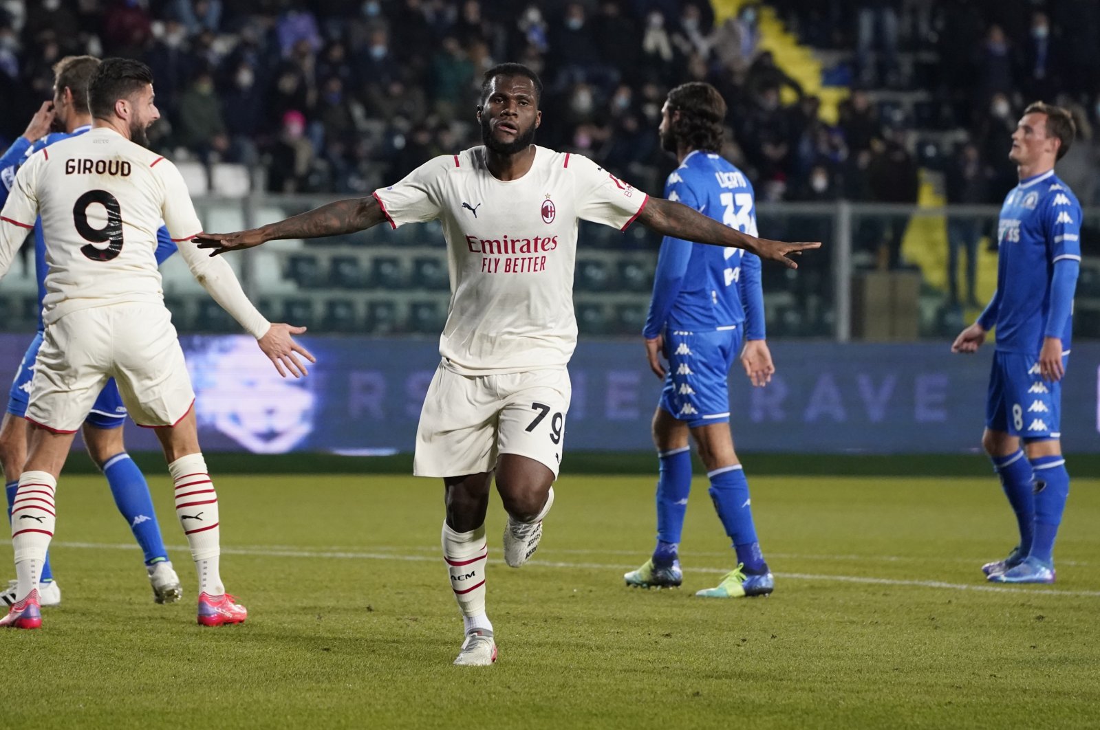 AC Milan&#039;s Franck Kessie (C) celebrates after scoring in a Serie A game against Empoli, Empoli, Italy, Dec. 22, 2021. (AP Photo)