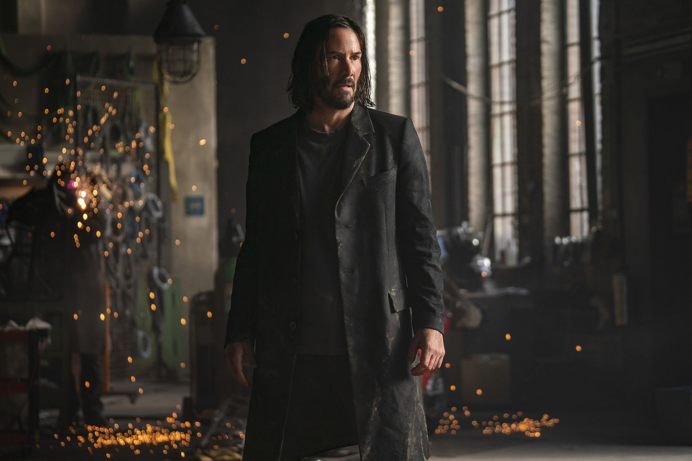 Keanu Reeves, in a scene from the film "The Matrix Resurrections." (Warner Bros. via AP)