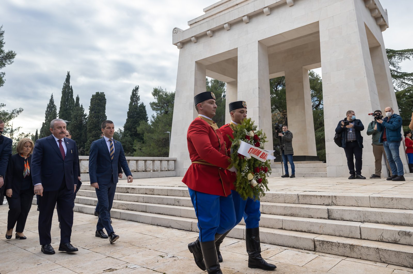 Parliament Speaker Mustafa Şentop lays a wreath at the statue erected in the memory of Nazi-era victims, Podgorica, Montenegro, Dec. 23, 2021 (AA Photo)