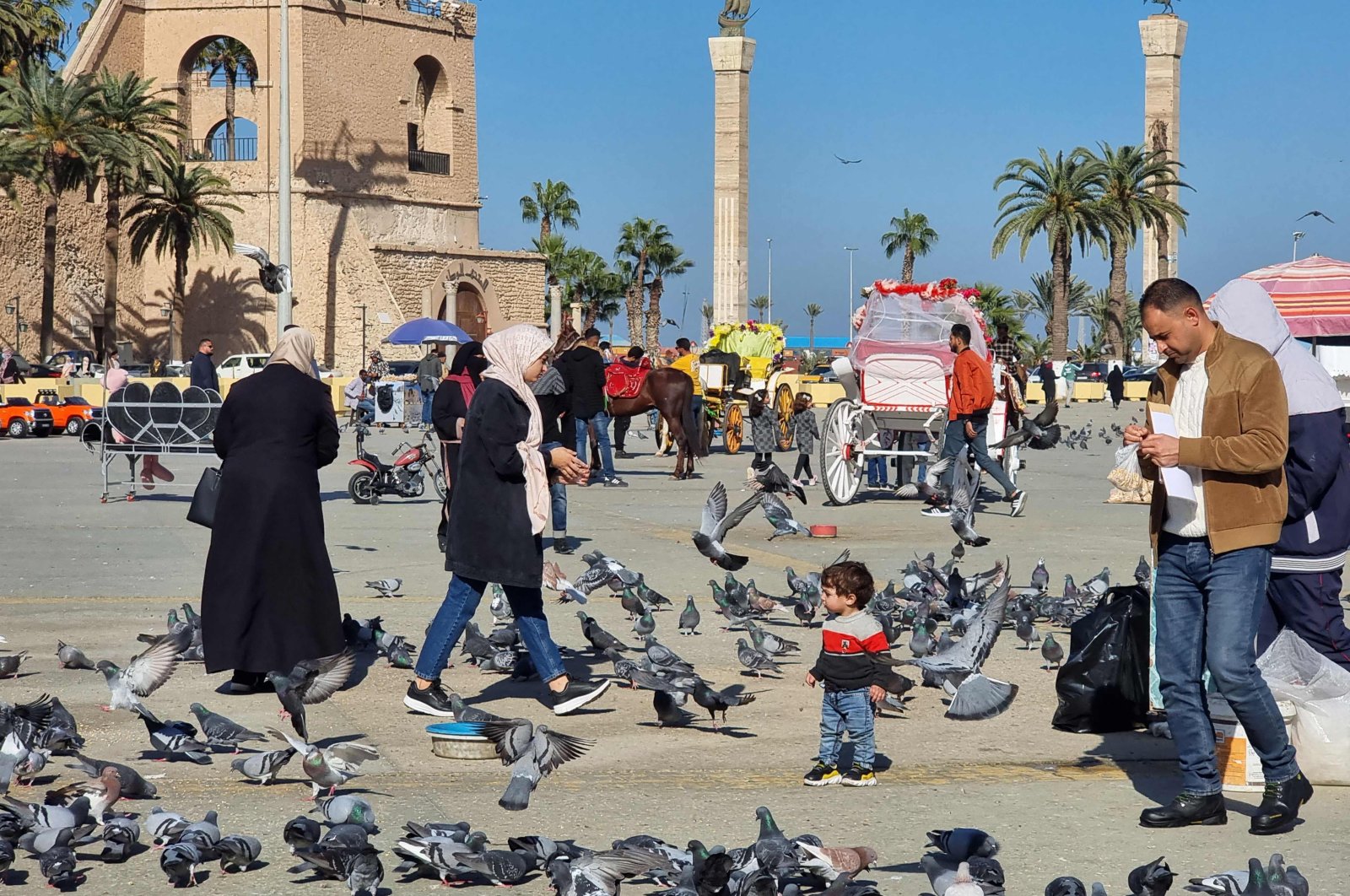 People visit the old town in Tripoli, Libya, Dec. 22, 2021. (AFP Photo)