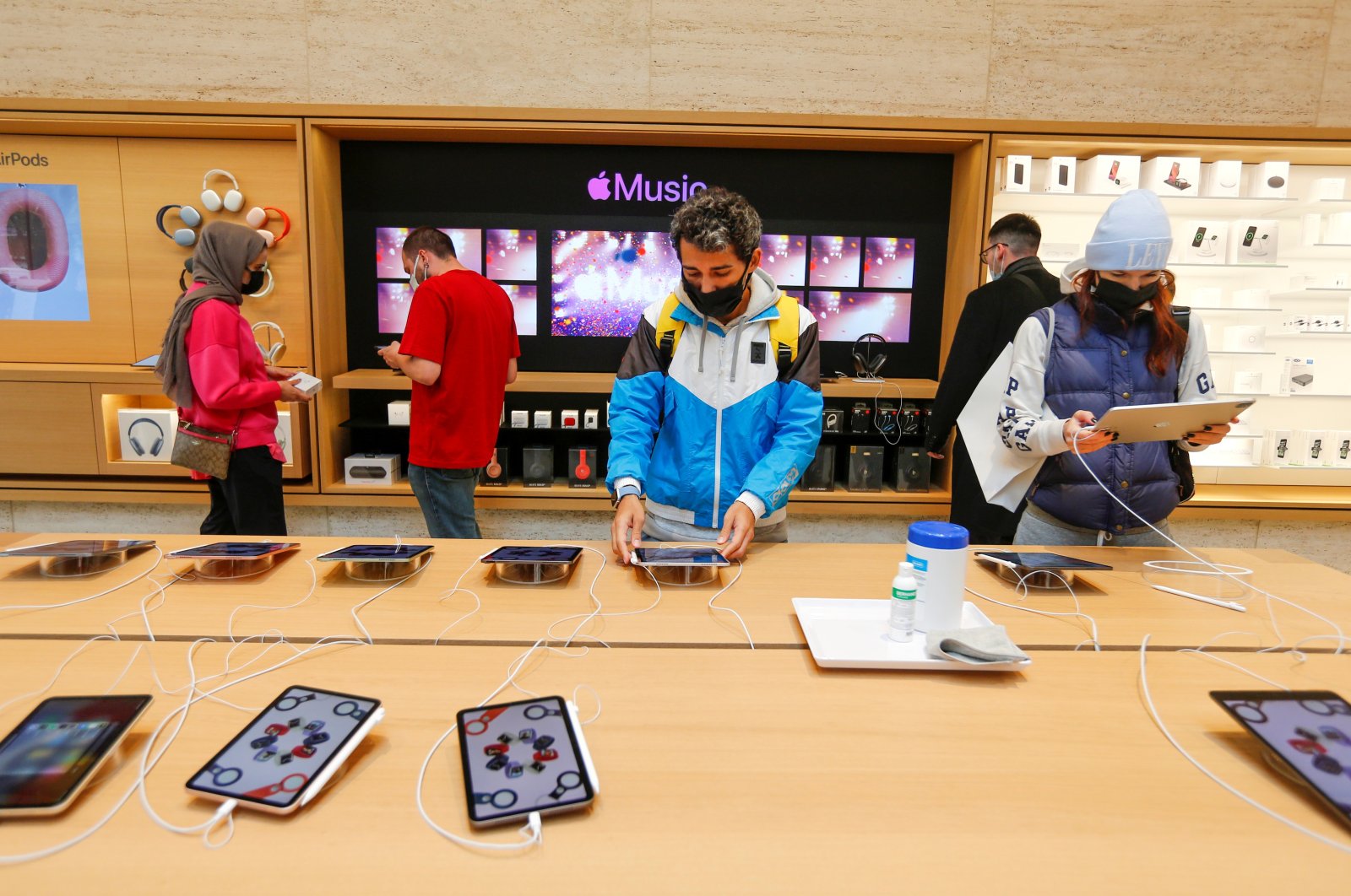 People browse products at an Apple store in Istanbul, Turkey, Nov. 24, 2021. (Reuters Photo)