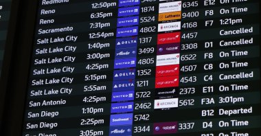 Canceled Delta Air Lines and an Alaska Airline flight on the flight information display system at the San Francisco International Airport on Christmas Eve in San Francisco, California, U.S., Dec. 24, 2021. (EPA Photo)