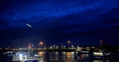 French fishing boats block the entrance to the port of Saint-Malo as fishermen planned to block ferry traffic into two other Channel ports and the movement of goods through the rail tunnel between France and the U.K. in protest over post-Brexit fishing rights, Nov. 26, 2021. (AFP File photo)