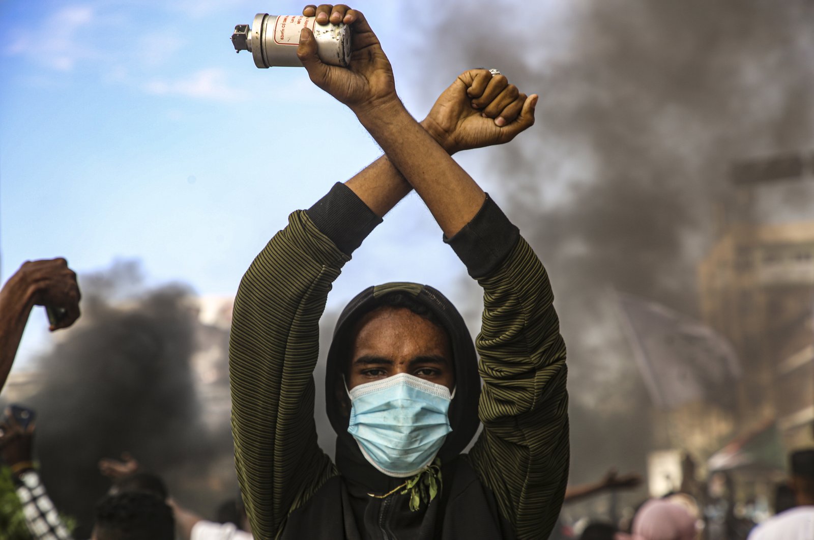 Sudanese protesters clash with security forces during an anti-coup protest near the presidential palace in the capital Khartoum, Sudan, Dec. 25, 2021. (EPA Photo)