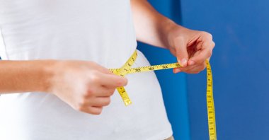Obesity is defined as increased abnormal fat accumulation that endangers human health in the short and long term. (Shutterstock Photo)