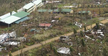This photo provided by the Malacanang Presidential Photographers Division shows damaged homes due to Typhoon Rai in Dinagat island, southern Philippines on Dec. 22, 2021. (AP Photo)