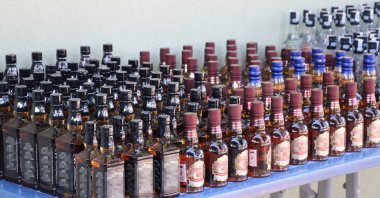 Bottles of bootleg drinks seized in an operation in Denizli, western Turkey, Dec. 24, 2021. (AA PHOTO) 