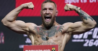 Conor McGregor poses during a ceremonial weigh-in for a UFC 264 mixed martial arts bout, Las Vegas, U.S., July 9, 2021. (AP Photo)