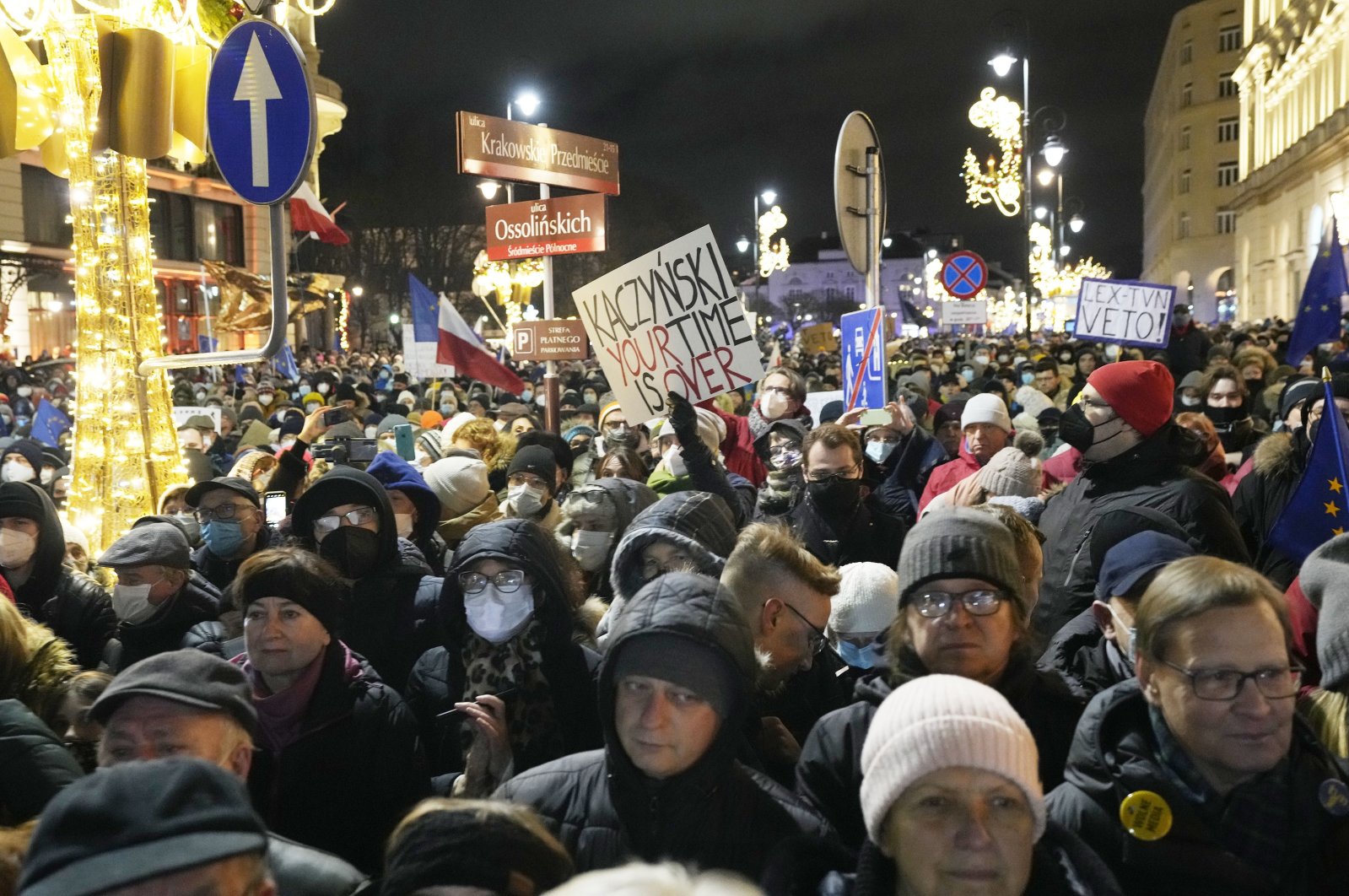 People demonstrate after the Polish parliament approved a bill that is widely viewed as an attack on media freedom, in Warsaw, Poland, Dec. 19, 2021. (AP Photo)