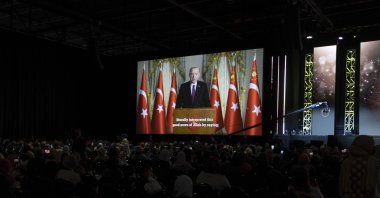 President Recep Tayyip Erdoğan speaks in a televised message broadcast at the MAS-ICNA annual convention in Chicago, U.S., Dec. 27, 2021. (AA Photo)