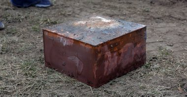 Workers recover a box believed to be the 1887 time capsule that was put under Confederate Gen. Robert E. Lee&#039;s statue pedestal in Richmond, Virginia, U.S., Dec. 27, 2021. (AP Photo)