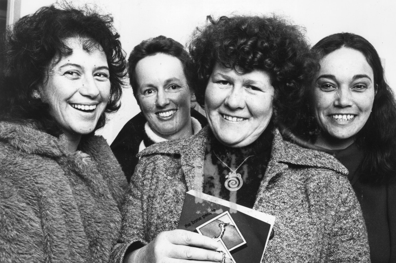 Novelist Keri Hulme (2nd R) poses with Spiral Publishing collective members Miriama Evans (L), Marian Evans and Irihapeti Ramsden (R) in Wellington, New Zealand on July 16, 1984. (AP)