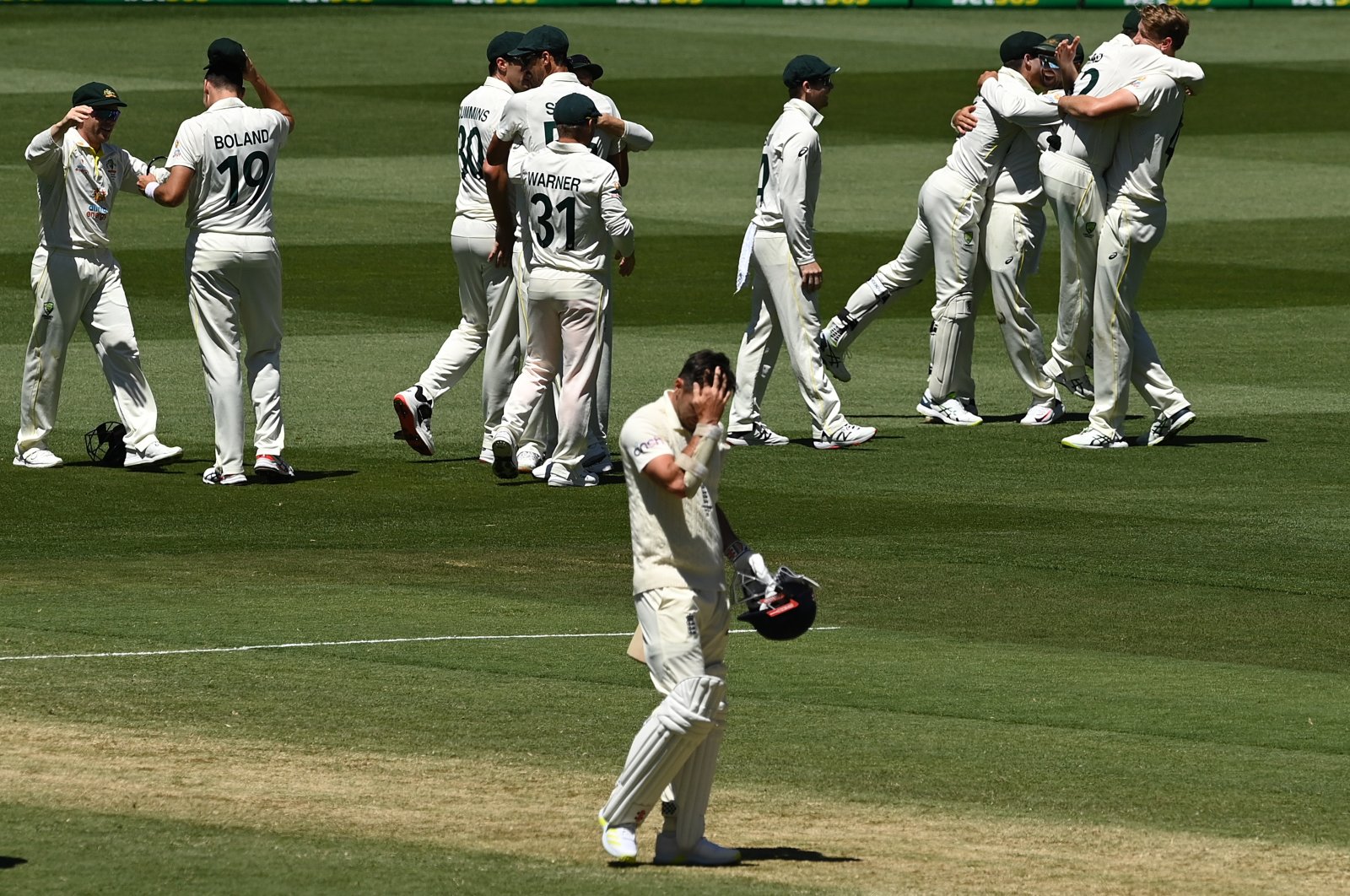 England&#039;s Jimmy Anderson (C) leaves the field after being dismissed on Day 3 of the 3rd Ashes Test between Australia and England, Melbourne, Australia, Dec. 28, 2021. (EPA Photo)