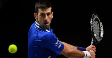 Serbia&#039;s Novak Djokovic hits a return during the Davis Cup semifinal, Madrid, Spain, Dec. 3, 2021. (AFP Photo)