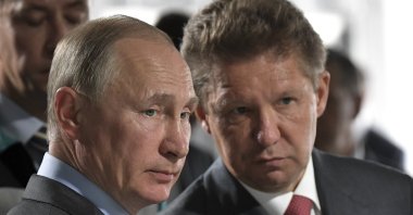 Russian President Vladimir Putin (L) and Alexei Miller, Russian natural gas giant Gazprom CEO, attend a meeting of major investment projects implementation in the Russian Far East as part of his trip to the Nizhne-Bureiskaya Hydroelectric Power Plant in Novobureyskiy, Russia, Aug. 3, 2017. (Kremlin Pool Photo via AP)