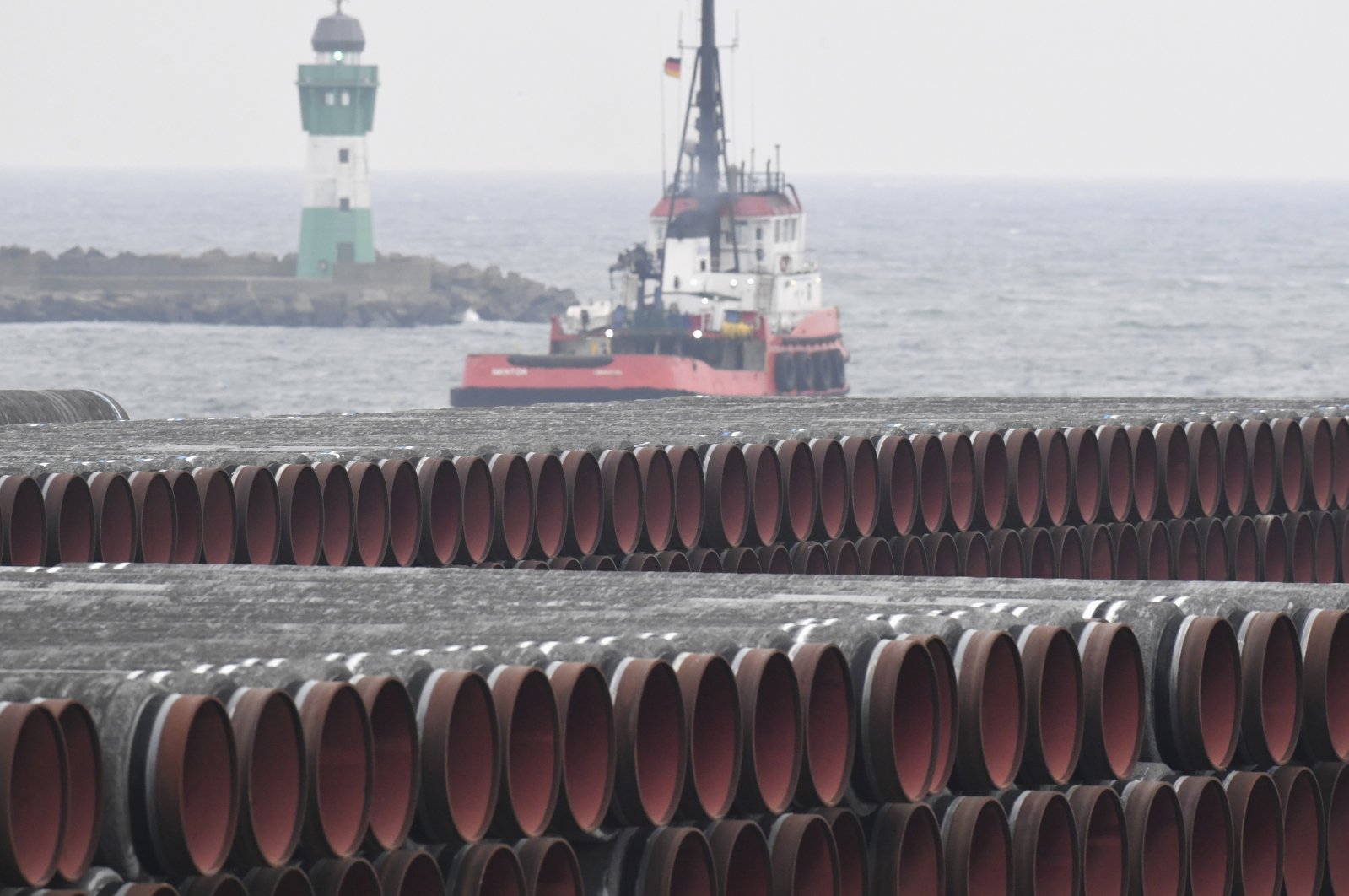 Pipes for the Nord Stream 2 Baltic Sea gas pipeline are stored on the premises of the port of Mukran near Sassnitz, Germany, Dec. 4, 2020. (DPA via AP)