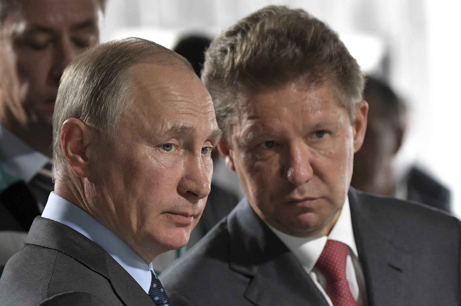 Russian President Vladimir Putin (L) and Alexei Miller, Russian natural gas giant Gazprom CEO, attend a meeting of major investment projects implementation in the Russian Far East as part of his trip to the Nizhne-Bureiskaya Hydroelectric Power Plant in Novobureyskiy, Russia, Aug. 3, 2017. (Kremlin Pool Photo via AP)