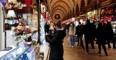 People shop at the Spice Market also known as the Egyptian Bazaar in Istanbul, Turkey, Dec. 16, 2021. (Reuters Photo)