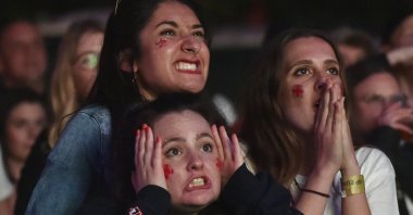 English supporters react watching the Euro 2020 final between England and Italy at a fan zone in Manchester, England, July 11, 2021. (AP Photo)