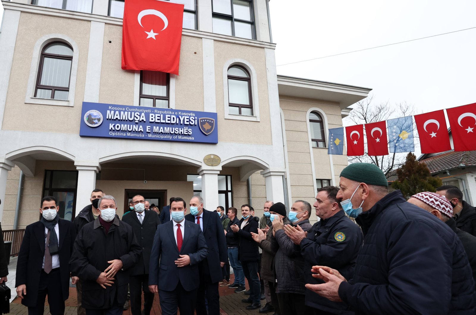 Defense Minister Hulusi Akar greets citizens during his visit to the Turkish town of Mamusa, Kosovo, Dec. 29, 2021. (AA Photo)