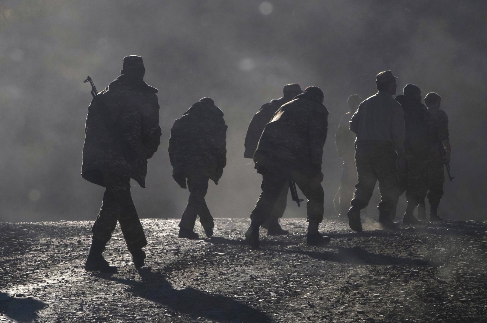 Armenian soldiers walk along the road near the border between Nagorno-Karabakh and Armenia, Nov. 8, 2020. (AP Photo)