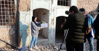 Students of a film school prepare to shoot a scene in the war-ravaged northern city of Mosul, Iraq, Dec. 15, 2021. (AFP Photo)