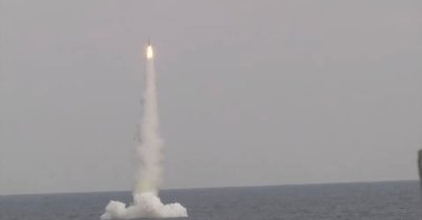 A Kalibr cruise missile is launched from Russian submarine Petropavlovsk-Kamchatsky of the Pacific Fleet during a test in the waters of the Sea of Japan, Dec. 21, 2021. (Russian Defence Ministry vie Reuters)