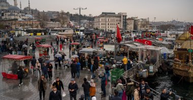 People walk in the Eminönü neighborhood, in Istanbul, Turkey, Dec. 29, 2021. (Reuters Photo)