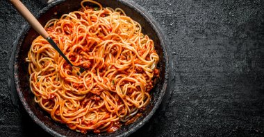 Pasta (whatever the shape) with Bolognese sauce remains a true classic. (Shutterstock Photo)